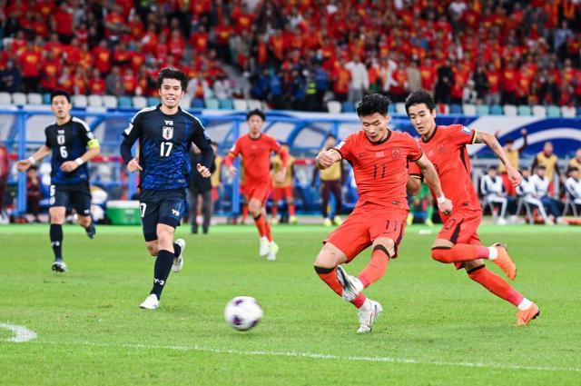 1735901038839012709.jpg (体育)(51)足球——世预赛:中国队对阵日本队XxjpseC007265_20241119_PEPFN0A001.jpg